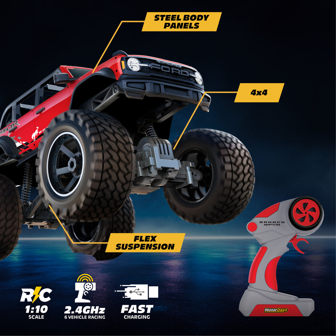 Red remote control monster truck with features highlighted on a dark background