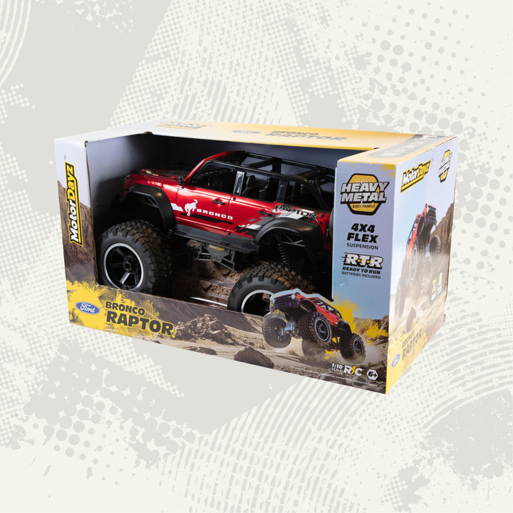 Toy truck in packaging with 'Heavy Metal' branding on a textured gray background