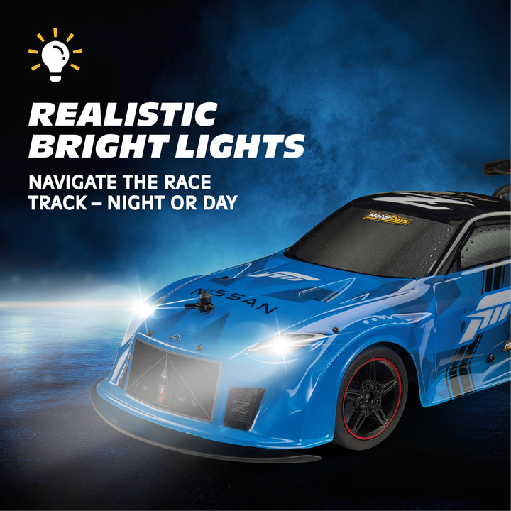 Blue race car with headlights on against a dark background, emphasizing realistic bright lights.