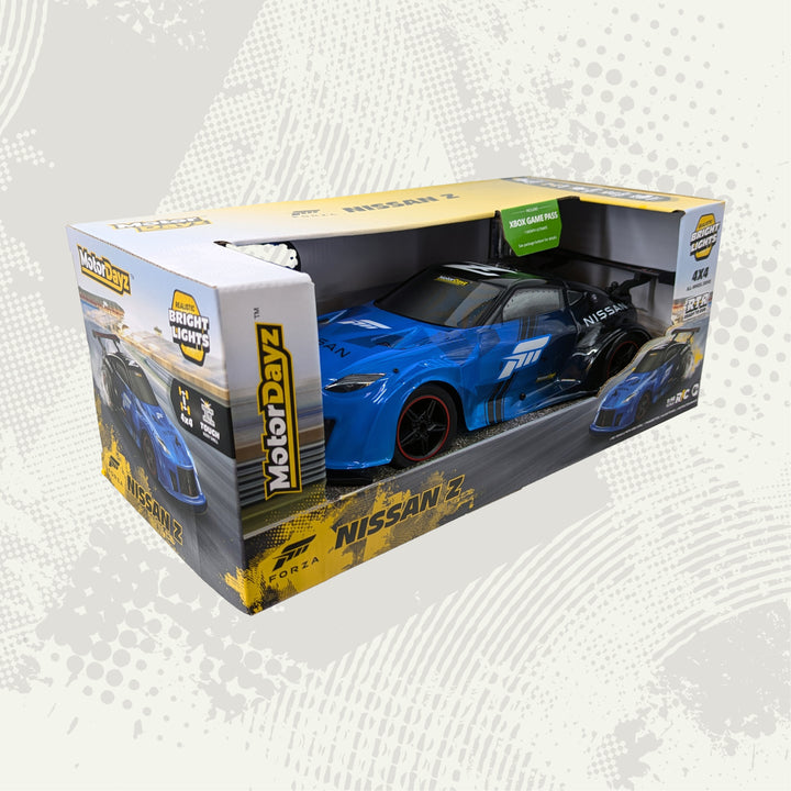 Model car in a box with Nissan branding on a white background