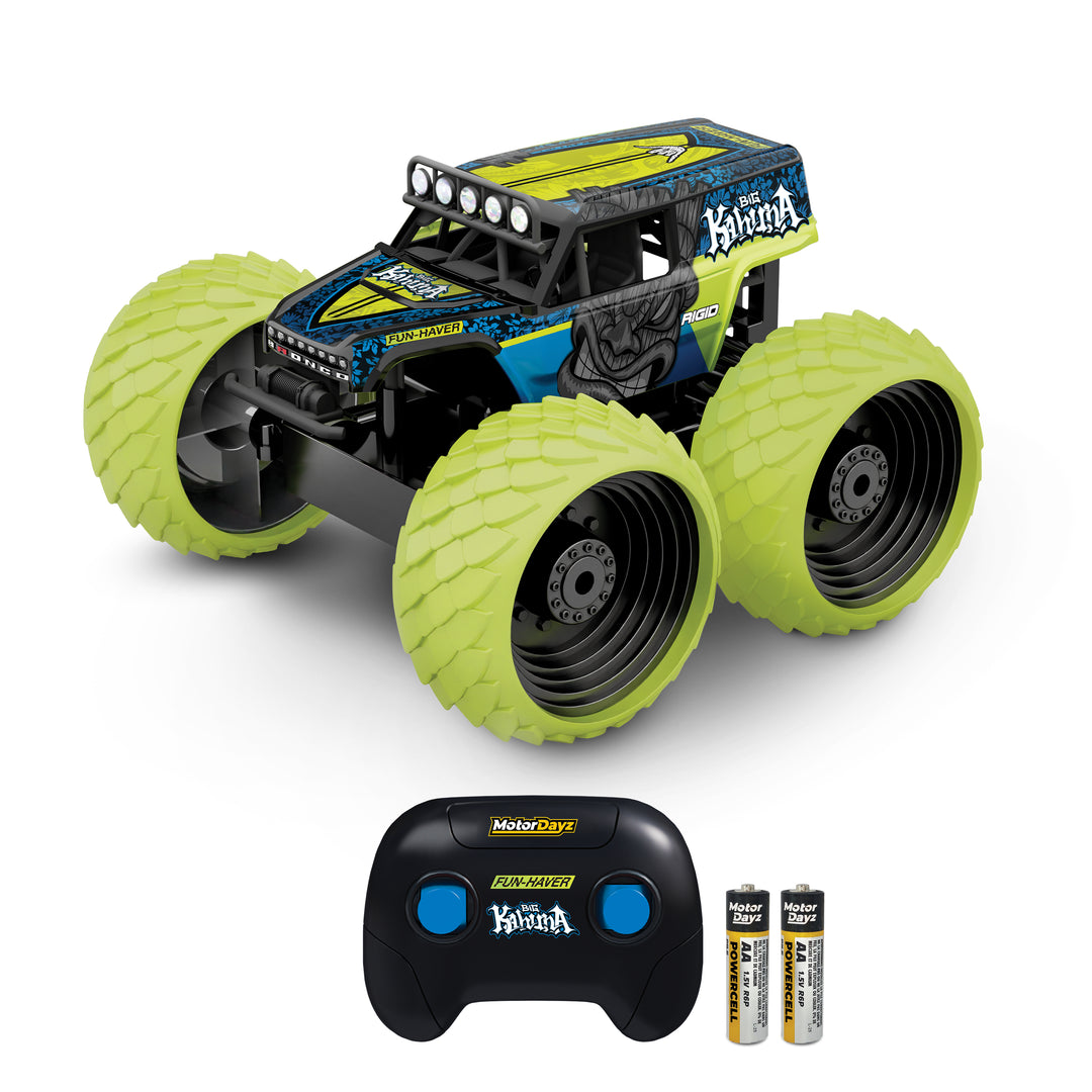 Monster truck toy with remote control and batteries on a white background