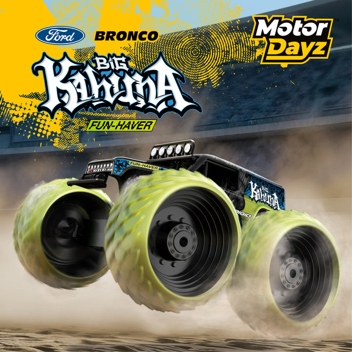 Monster truck with large wheels on a dirt track, featuring Ford Bronco and Motor Dayz branding.