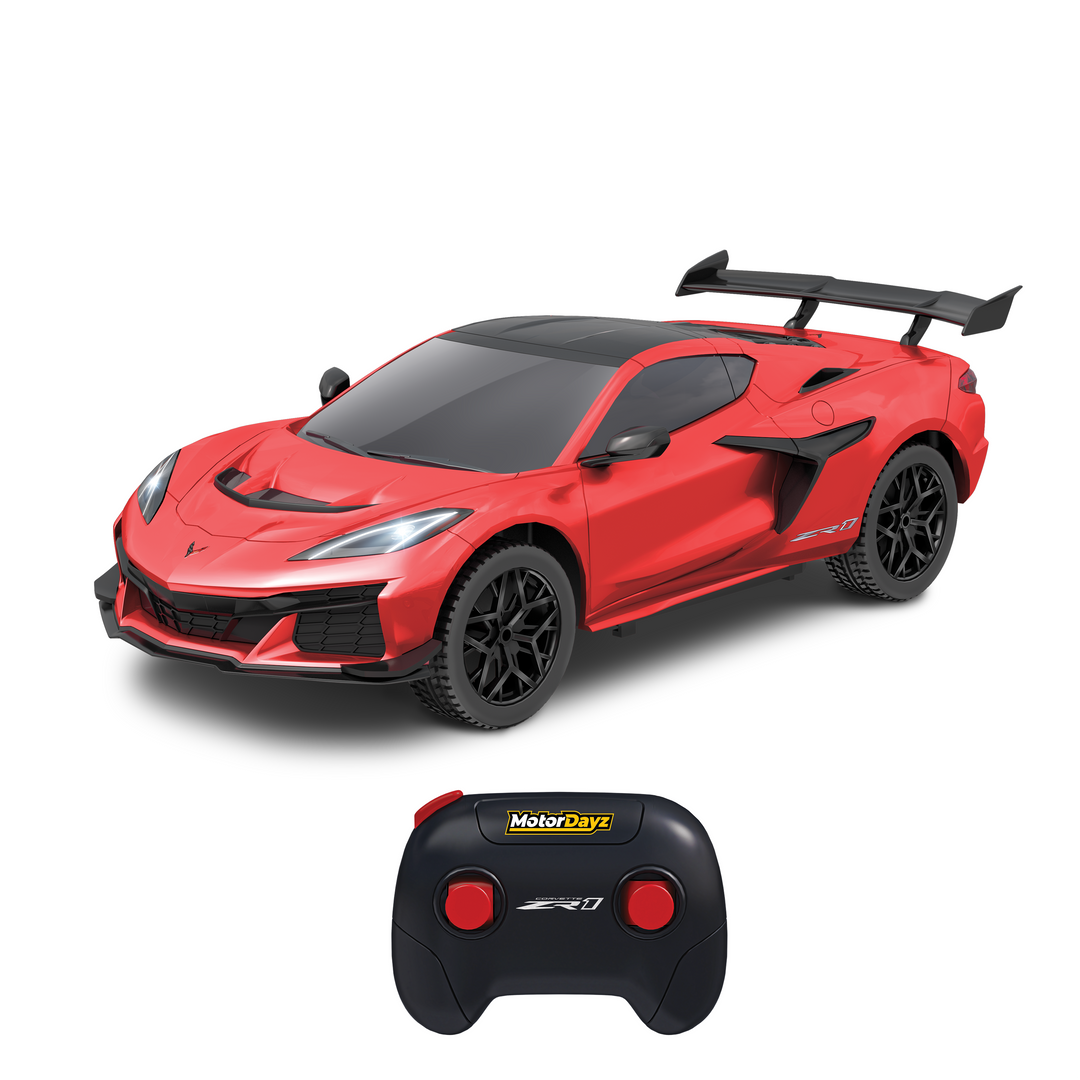Red toy sports car with black wheels and a remote control on a white background