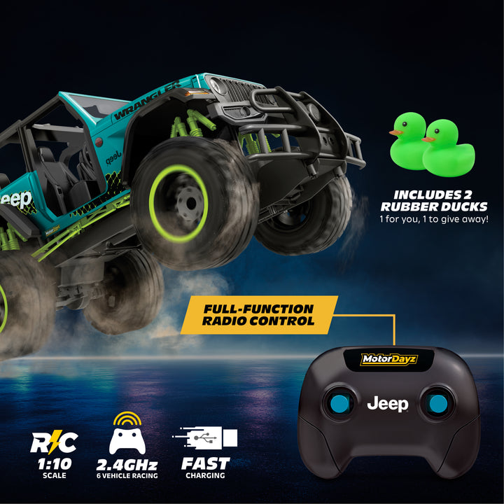 Teal | Toy monster truck with remote control and rubber ducks on a dark background
