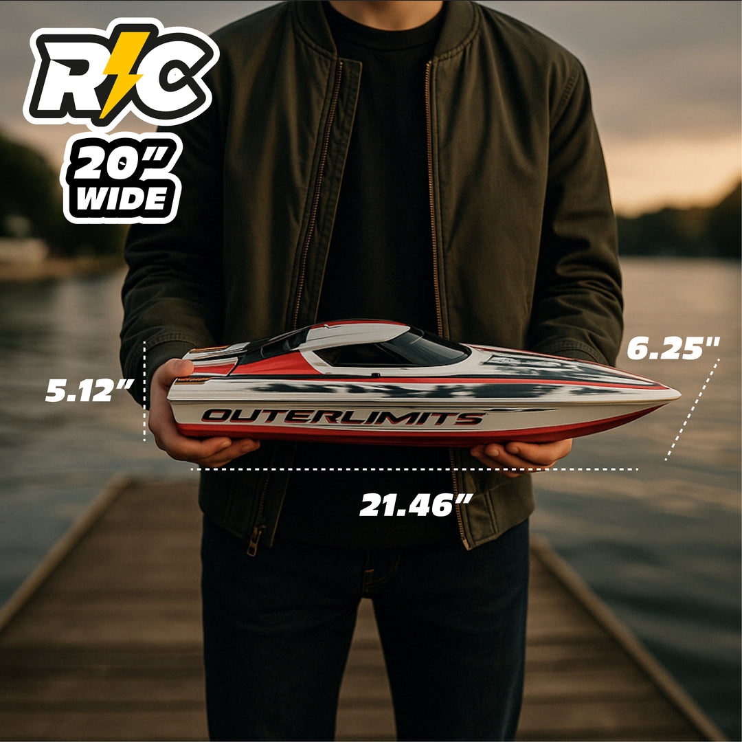 Person holding a model boat with dimensions labeled, set against a lake backdrop