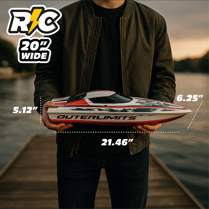 Person holding a model boat with dimensions labeled, set against a lake backdrop