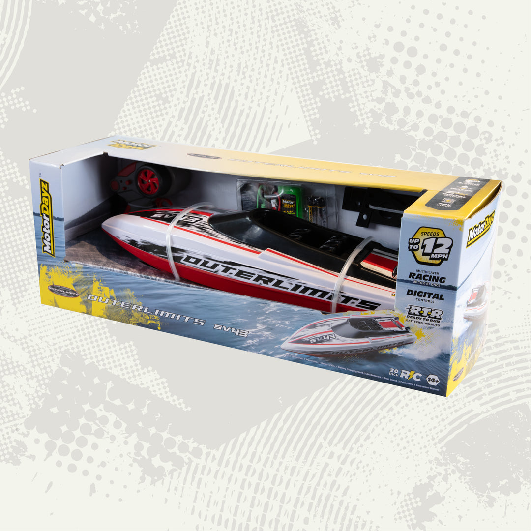 Boxed remote control boat with 'Outer Limits' branding on a light gray background
