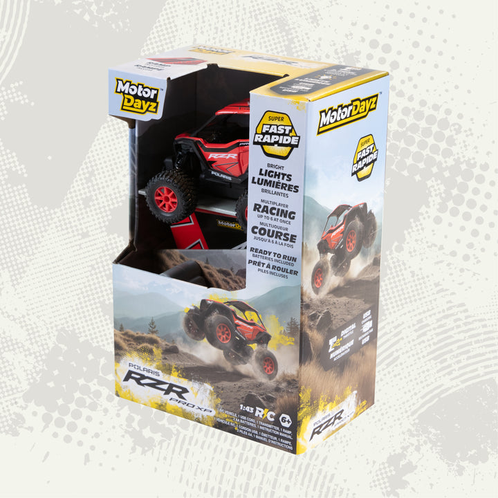 Toy truck in packaging with 'Motor Dayz' branding on a light gray background