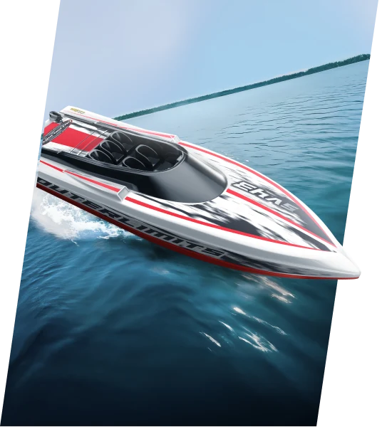 Model boat on water with a clear blue sky